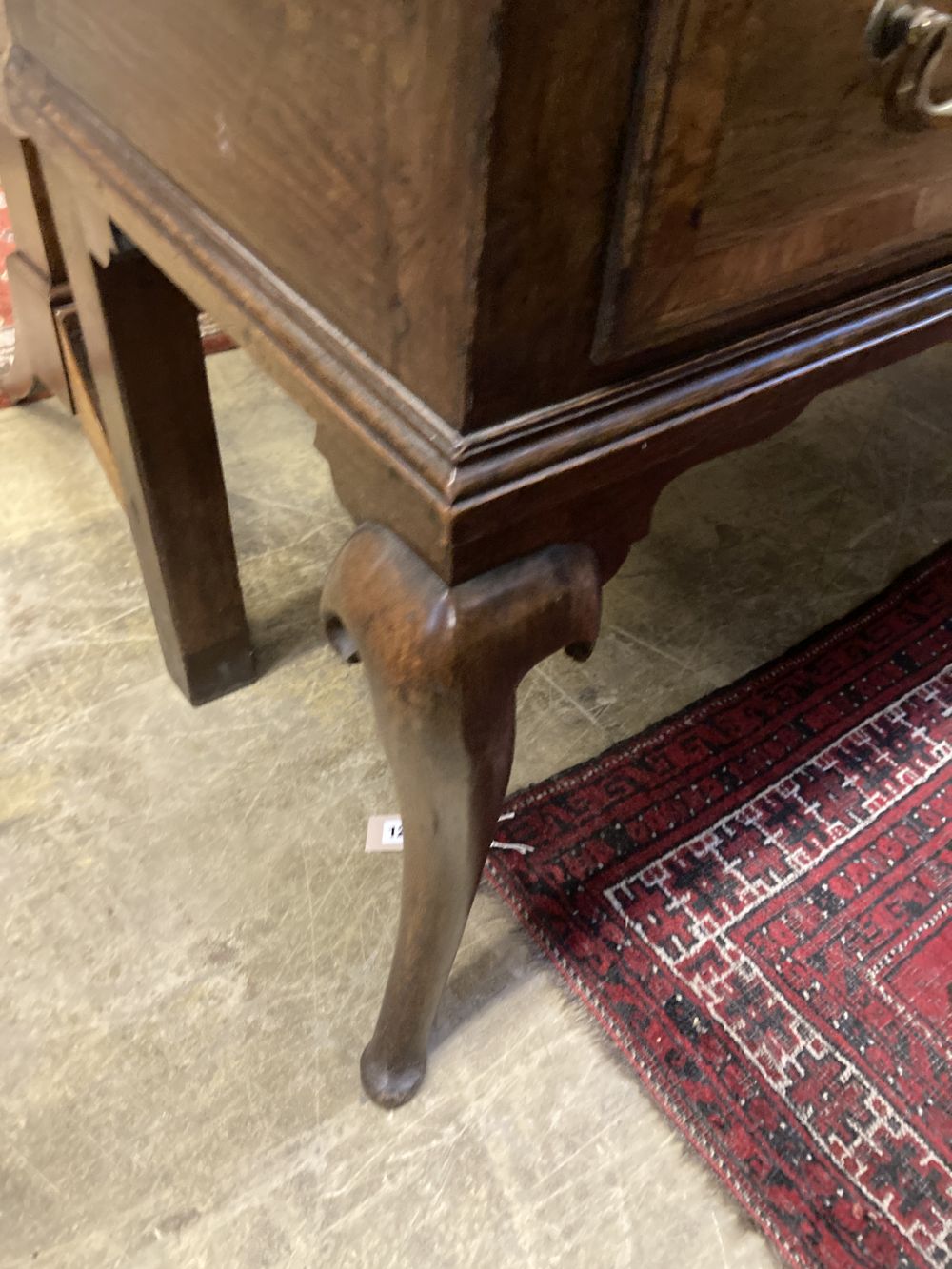 A mid 18th century oak low dresser, width 188cm depth 49cm height 83cm